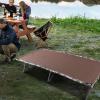 imageTIMBER RIDGE Folding Camping Cot for AdultsOutdoor Bed Camp Cots for Sleeping with Carry BagFoldable XL Hunting for Camping Hiking CamouflageHome Travel Support up to 600lbs TanTan