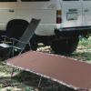 imageTIMBER RIDGE Folding Camping Cot for AdultsOutdoor Bed Camp Cots for Sleeping with Carry BagFoldable XL Hunting for Camping Hiking CamouflageHome Travel Support up to 600lbs TanTan