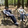 imageTIMBER RIDGE Oversized Hammock Camping Chair Swinging Chair with Adjustable Back and Seat Height Portable Folding Rocking Chair for Outdoor Lawn Backyard and Patio Supports 400lbs Black 2 PackTan